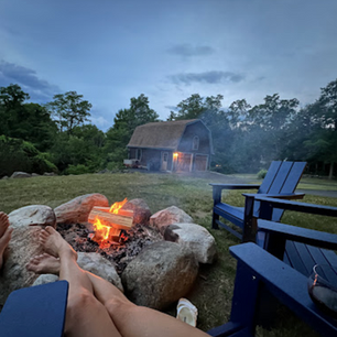 family in front of a bonfire