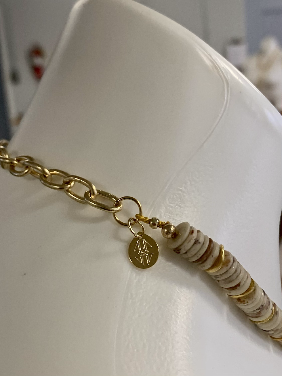 Thumbnail: Bone Heishi choker with padlock charm