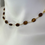 Thumbnail: Mini oval Tiger Eye beads with paperclip chain 