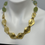 Thumbnail: Green Chalcedony & Hammered Gold  statement necklace. 