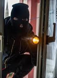 Photo Home Security Burglar Breaking Into House.jpg