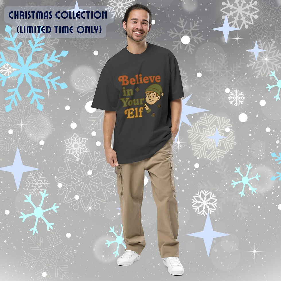 Oversized faded t-shirt featuring the Believe In Your Elf Christmas graphic