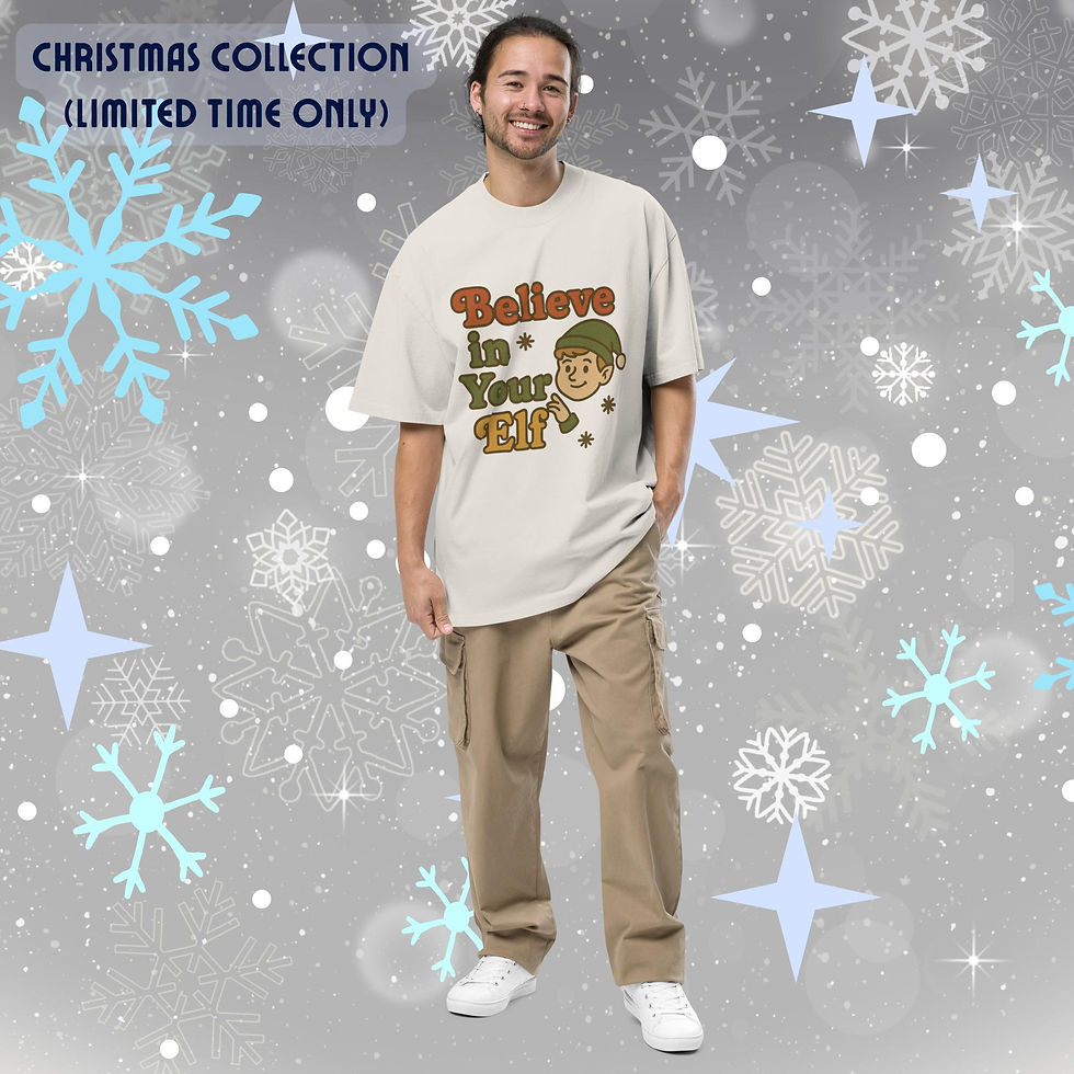 Oversized faded t-shirt featuring the Believe In Your Elf Christmas graphic