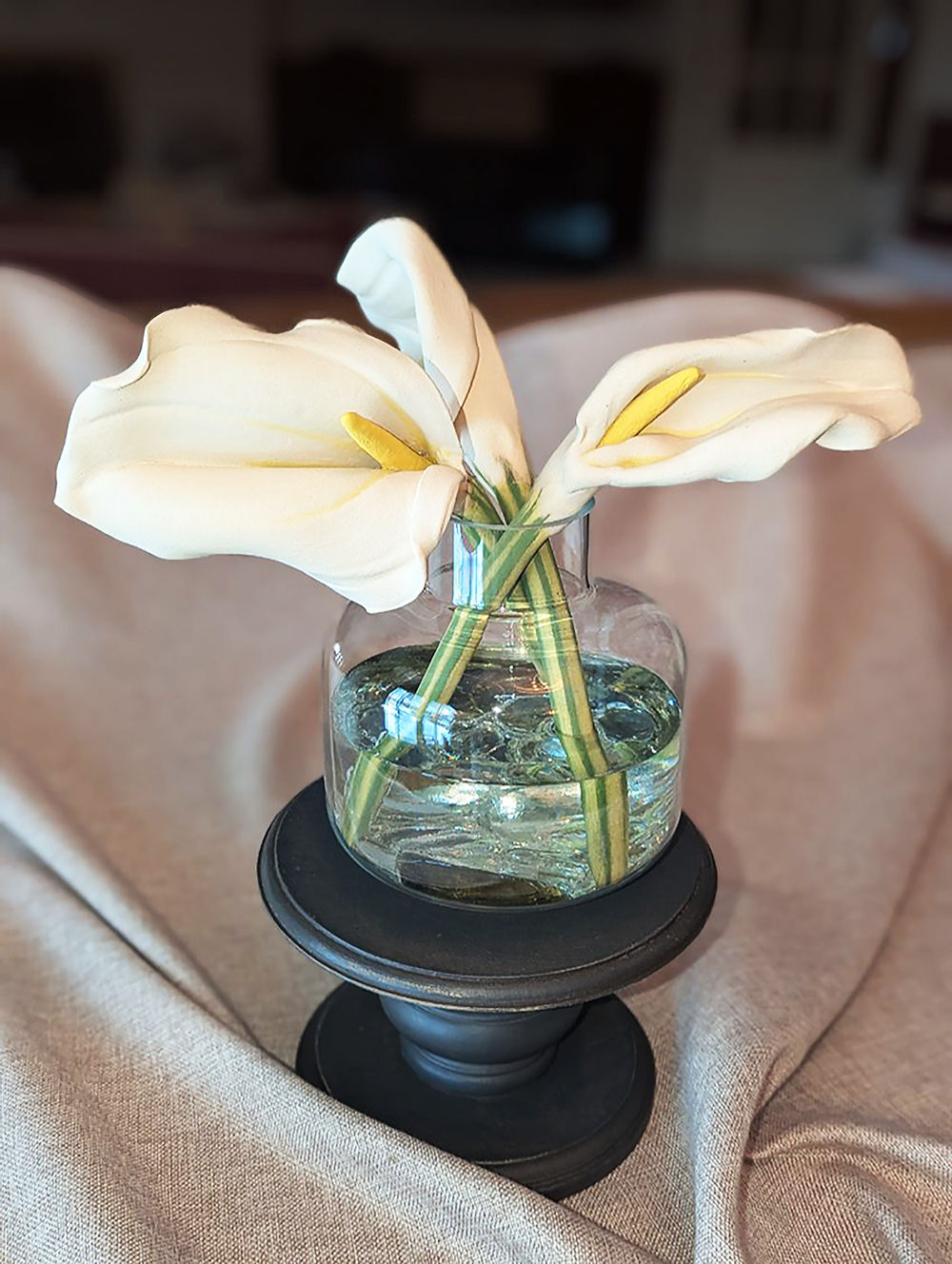Three Callas in a Low Round Vase