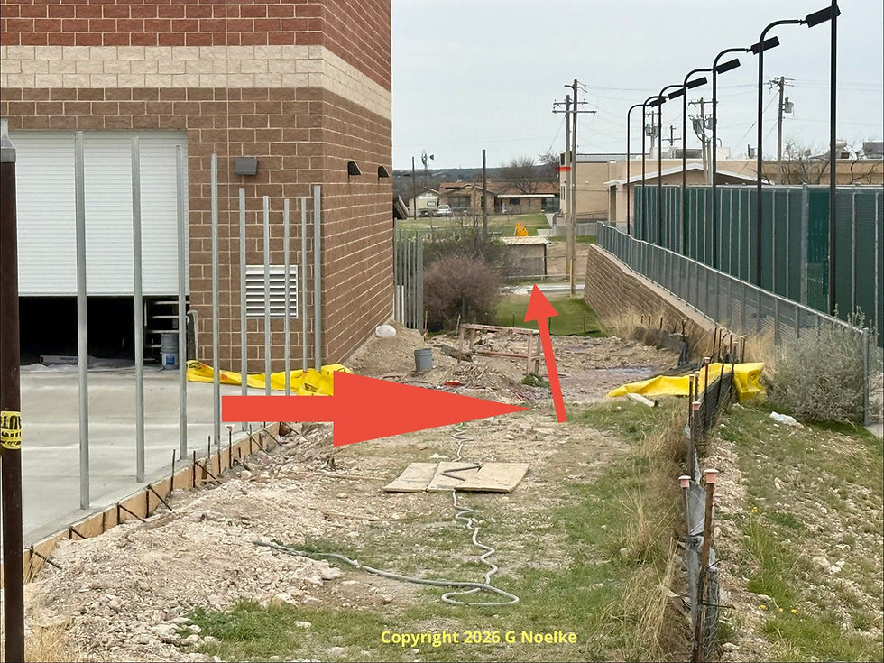 The concrete is now set on the west side of the new IC ISD transportation facility, and it is more transparent where the water is designed to drain. The stormwater runoff will drain into the City owned alley and go down to join the runoff on 4th Street. 