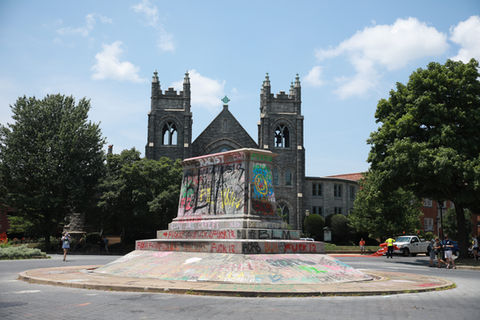 The pedestal that once held the JEB Stuart monument now sits empty, covered in graffiti. 