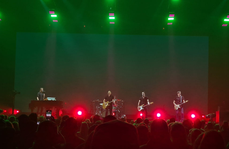 Musicians from the Bryan Adams band play