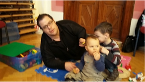 Father and sons in the play corner