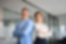 two-happy-executives-business-man-and-woman-standi-2024-06-24-21-57-38-utc.jpg
