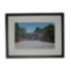 wall art of a Japanese-style red bridge and a person crossing with a blue umbrella with a black frame