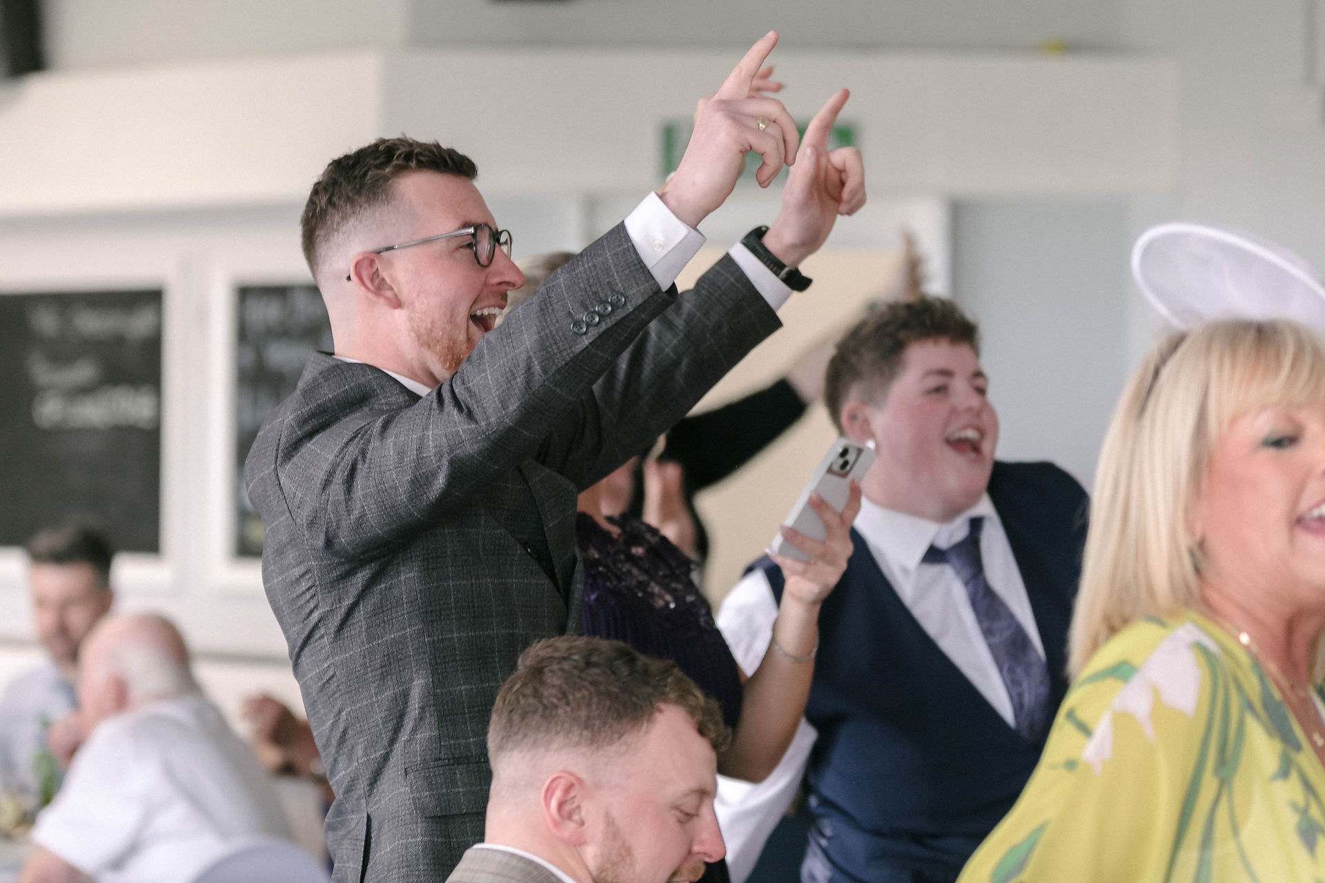 Enjoying the surprise singing waiter.