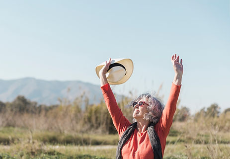 medium-shot-woman-with-sunglasses-hat.jpg