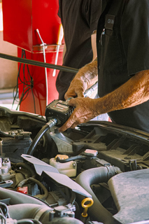 close-up portrait of oil changing process