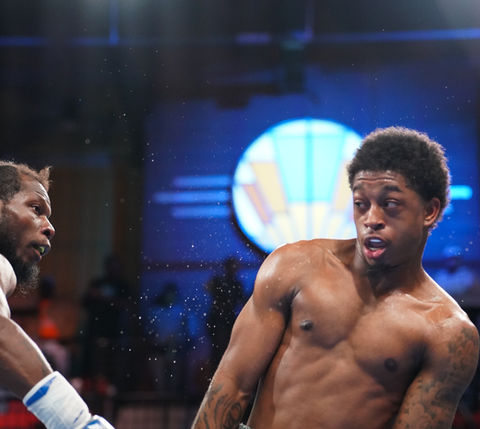 Baby Gee Garrett Rice Jr dodges punch at 20 Monroe Grand Rapids Salita Promotions