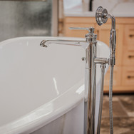 Silver taps of a bathtub