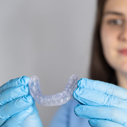 A picture of dental aligners. 
