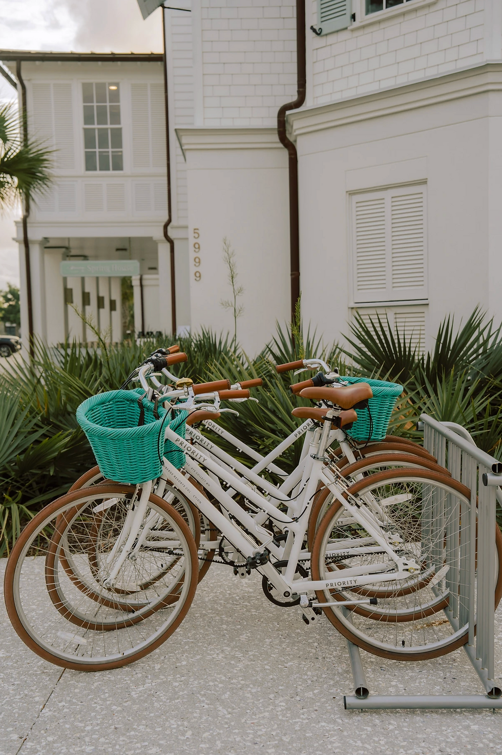 A set of bikes sits neatly outside the Dunlin Kiawah Island. Photographed by luxury hospitality photographer Kathryn Ann Waller.