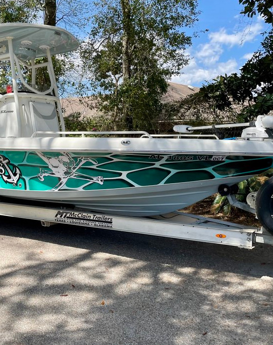 Team Vinson Charters boat on trailer, ready for Gulf Shores and Dauphin Island fishing trips with Captain Donnie and crew