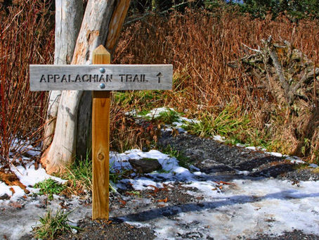 A sign in the woods for the Appalachian Trail