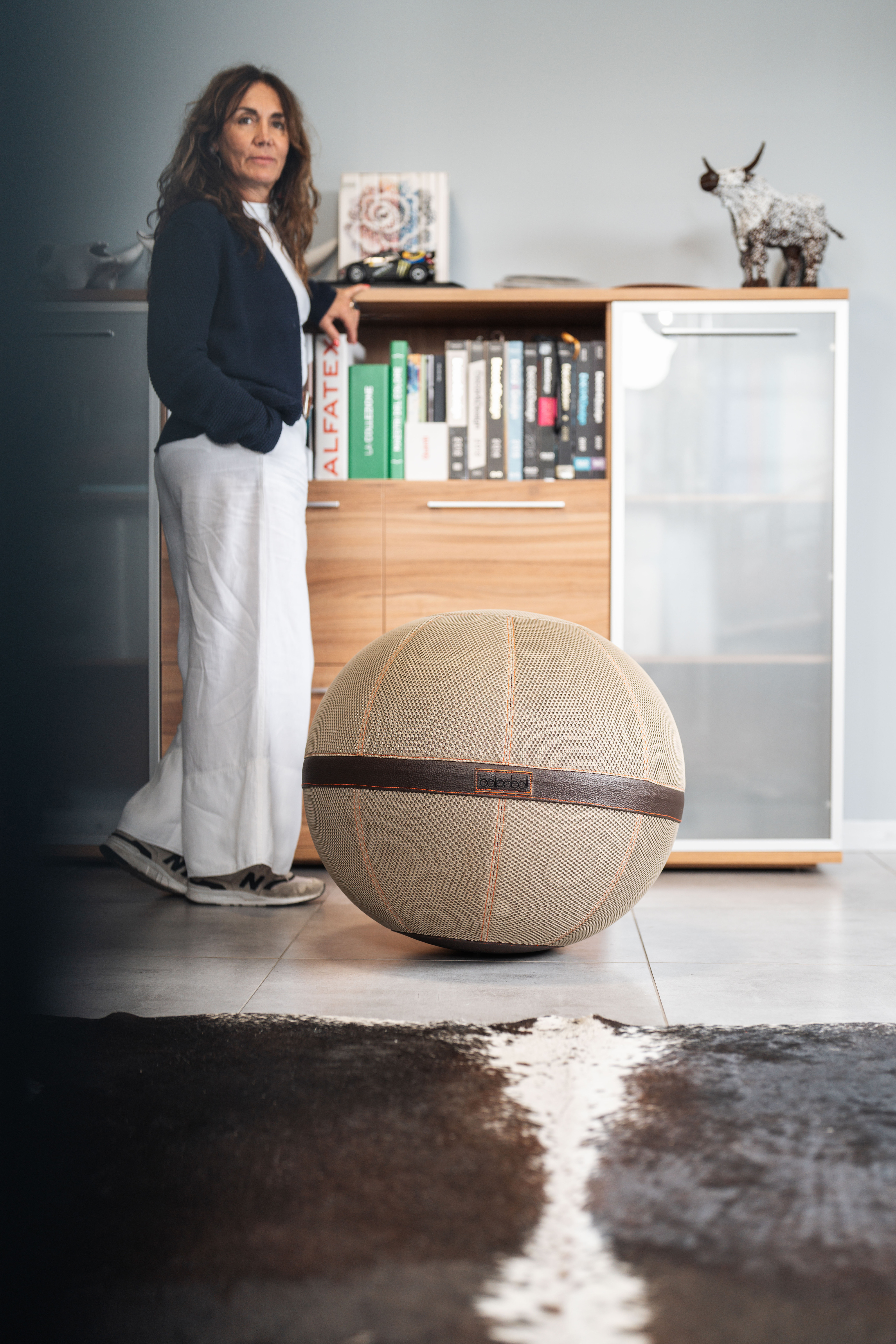 Beige coloured balanball in office setting
