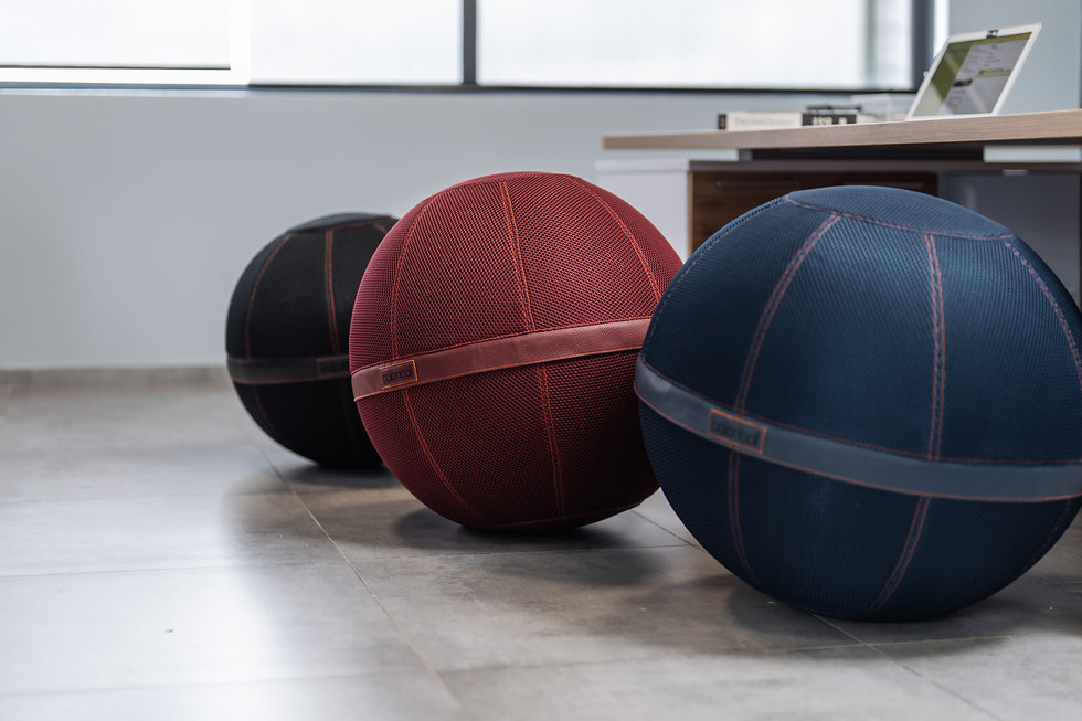 Thumbnail: Three balanballs in office setting