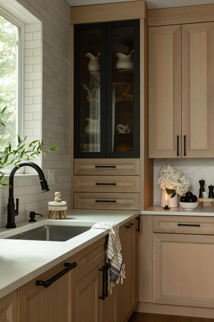 A classically styled full kitchen and lower level remodel including powder room