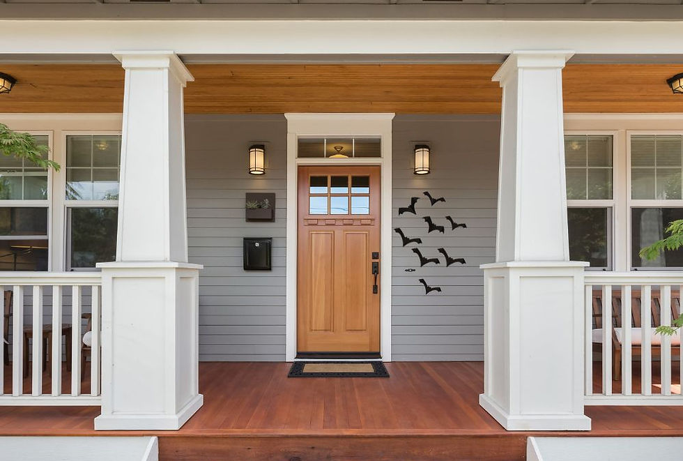 Halloween porch decor with bats on the side of the door