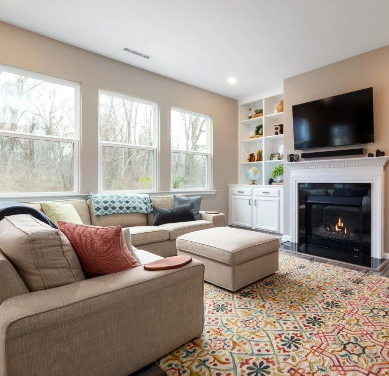 Living room with ottoman that has storage, a multi-functional piece of furniture