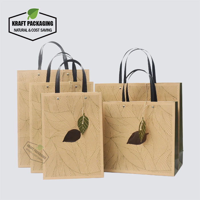 Thumbnail: Luxury Green printed flat handle Kraft gift bags with PVC window, leaf hangtag