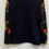 Miniatura: SUDADERA NEGRA / FLOREADA