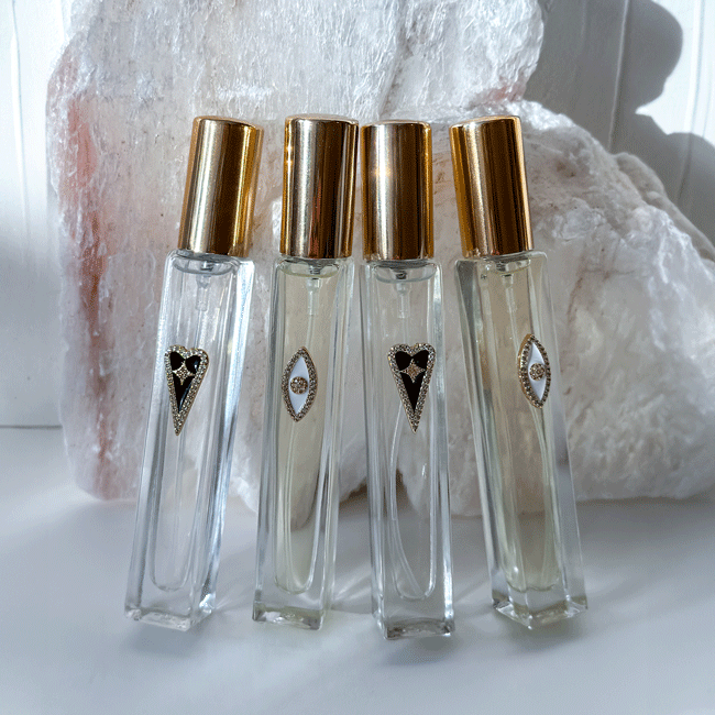 Thumbnail: White Eye Charm Aura Non-Toxic Eau De Toilette – A Sacred Mist for enhancing mindfulness, meditation, and relaxation.