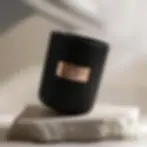 Mystic Eye Black Fig Candle in matte black vessel with wooden wick leaning on its side