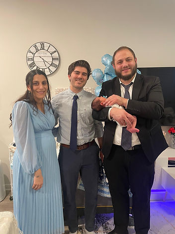 Mohel-Baby-and-parents-after-bris-in-pennsylvania.jpeg