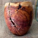 I strive to produce objects that focus on the natural beauty and characteristics of the wood, embracing and celebrating imperfection where I find it. I want my creations to be practical and beautiful, a pleasure to look at, to hold and to use. This includes pots, bowls, plates, vases, cutlery and jewellery, always striving to keep shapes simple and clean. I use only reclaimed or responsibly-sourced local wood.