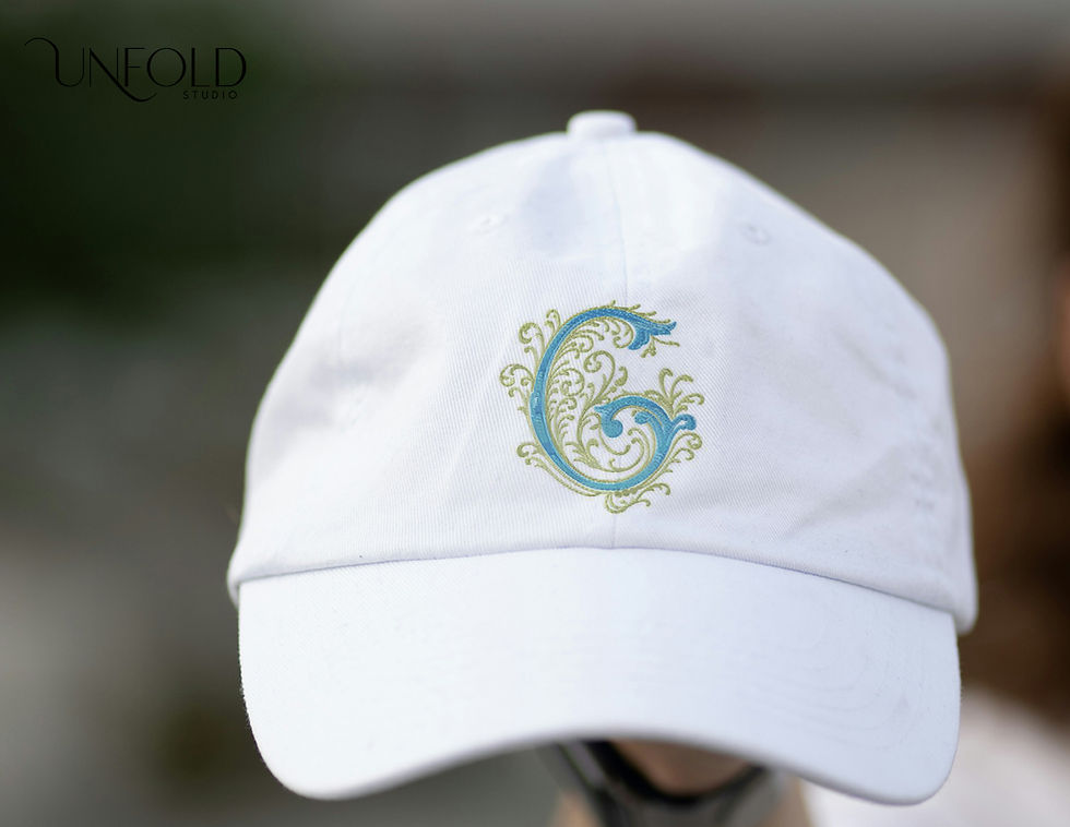 Thumbnail: Embroidered-style decorative letter G with elaborate swirls and scrolls, featuring intricate, flowing designs.