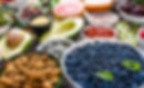 Bowl with almonds, bilberry, fresh fruit and other healthy food. Organic breakfast with ve