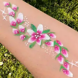 flower face paint arm design