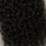 Close-up of curly Raw & Virgin Hair texture in black.