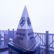 The summit marker of Mt. Fansipan, Indochina's highest peak.
