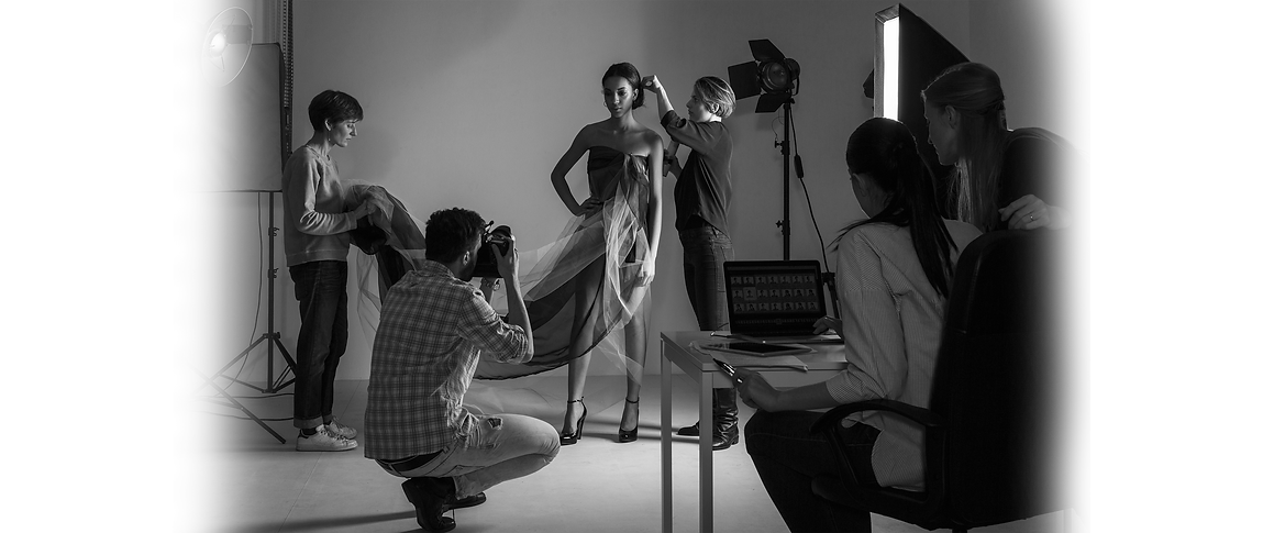 stylists-styling-model-in-low-key-photography-stud-2025-04-05-03-12-41-BW-BLUR.png