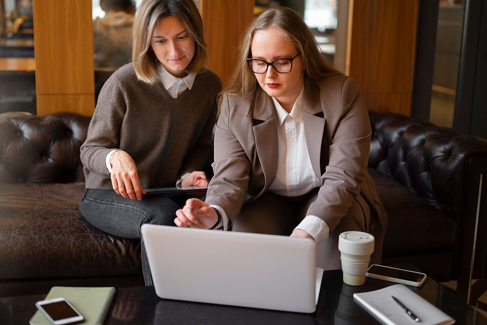 professional-women-stylish-suit-working-with-laptop-office.jpg