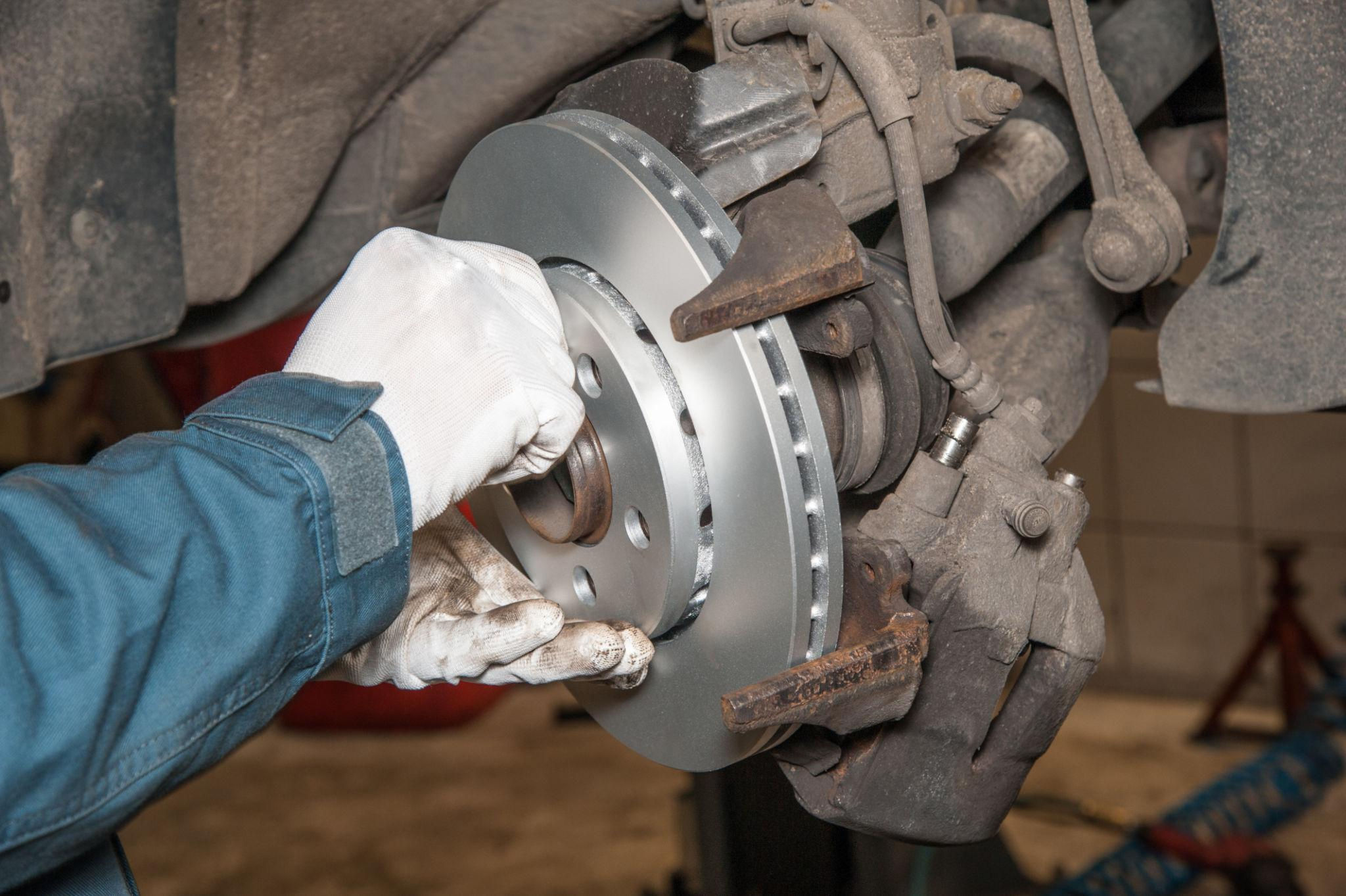 Installing new brake pads and rotors