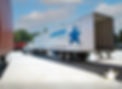 Landstar-White-Truck-open Trailer-Backing into bay_1200x880.jpg