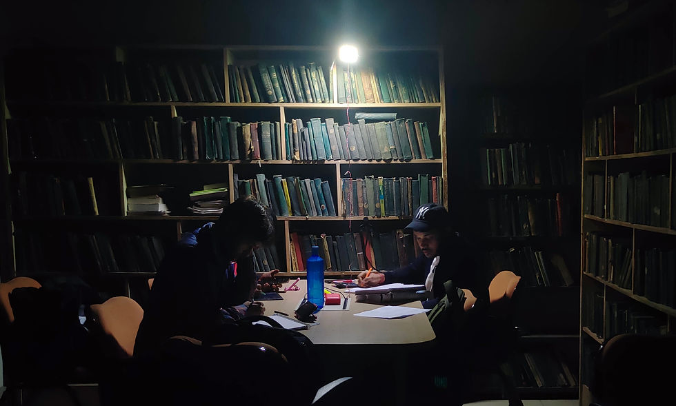 Students studying in Hardayal Library without Electricity