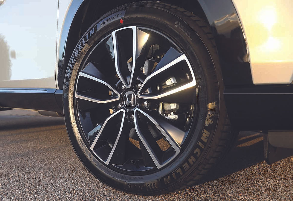 The HR-V sits on new five-spoke alloys, the 18" diameter boosting ground clearance, wearing Michelin Primacy tyres.