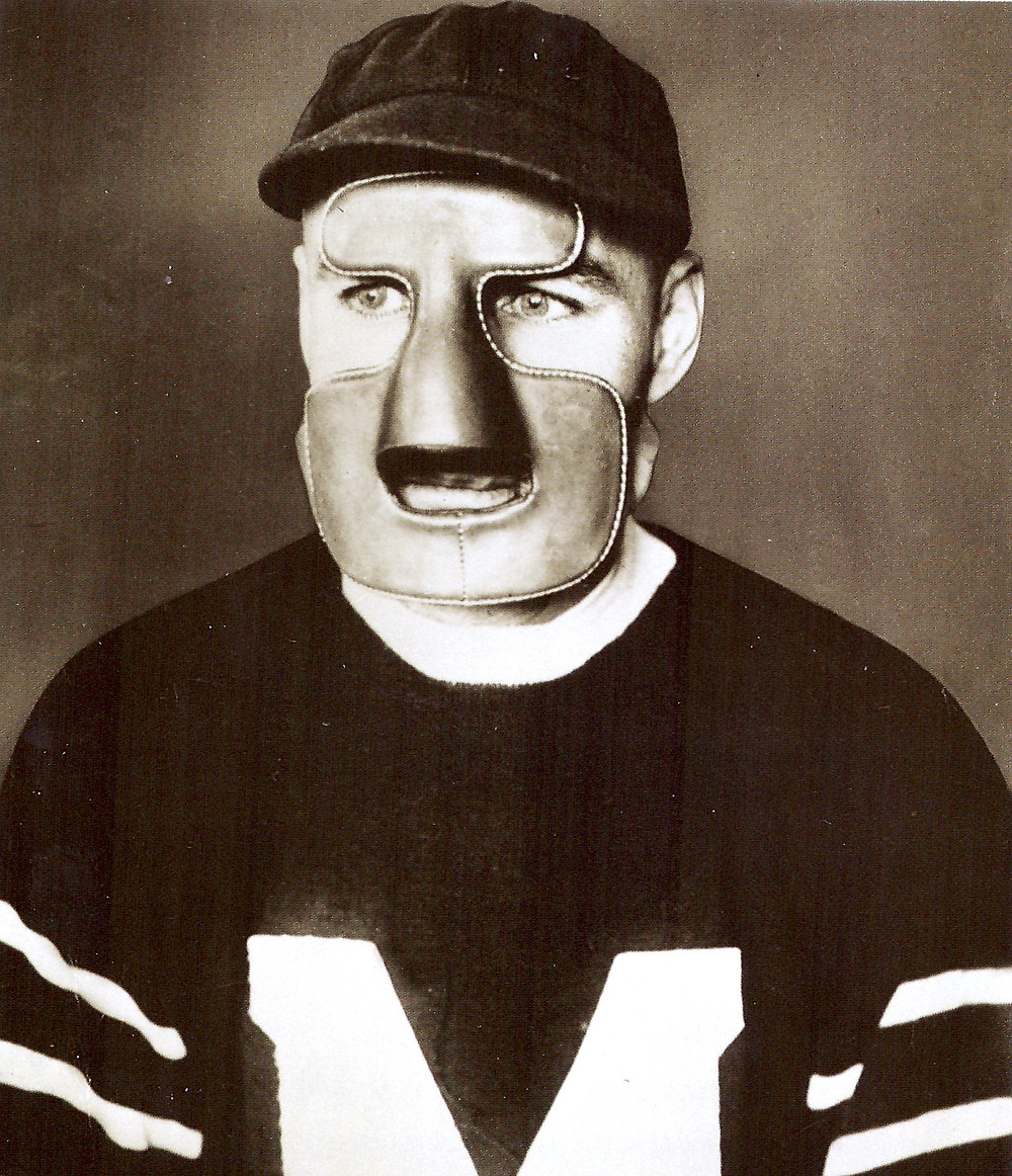 Clint Benedict wearing the first goalie mask