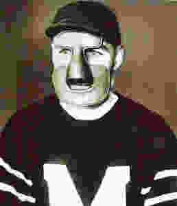 Clint Benedict wearing the first goalie mask