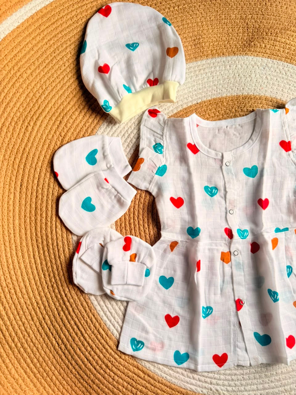 Thumbnail: Vizha Muslin Frill Sleeve Frock, Cap, Mitten, Booties Set