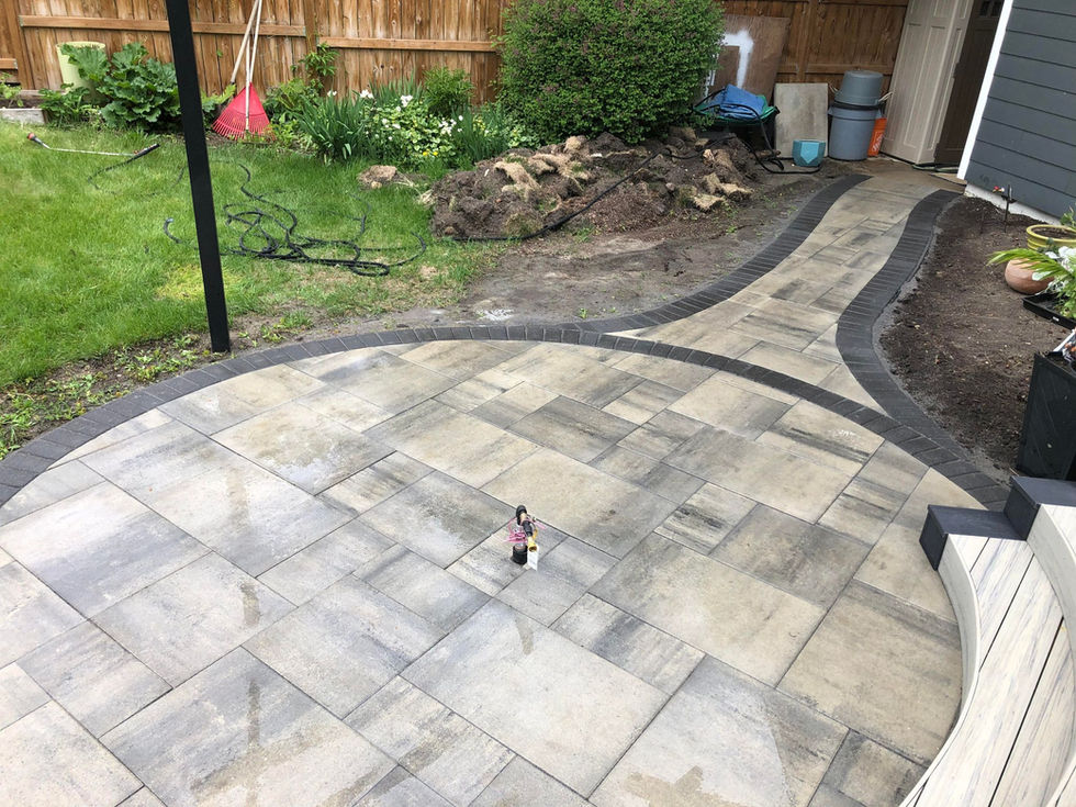 Circular fire pit area with dimensions 12 pavers Tofino grey for a future pergola.