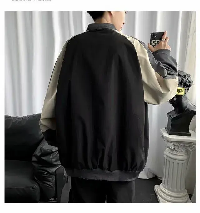 Thumbnail: grey baseball jacket